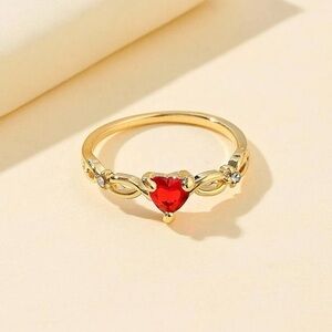 Gold Heart Ring with Red Gem Accent